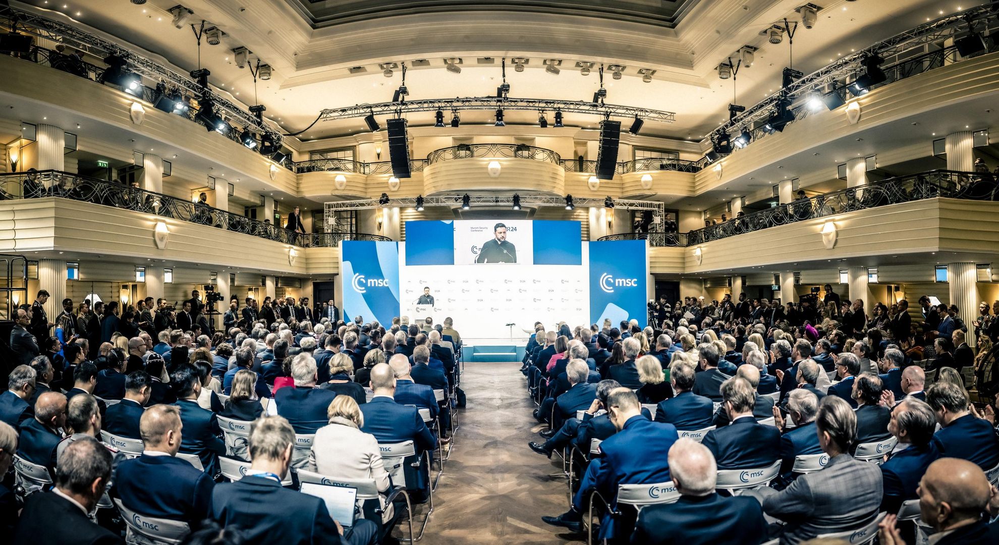 Ukrainian President Volodymyr Zelenskyy delivers a speech in the packed main hall of the Munich Security Conference 2025.